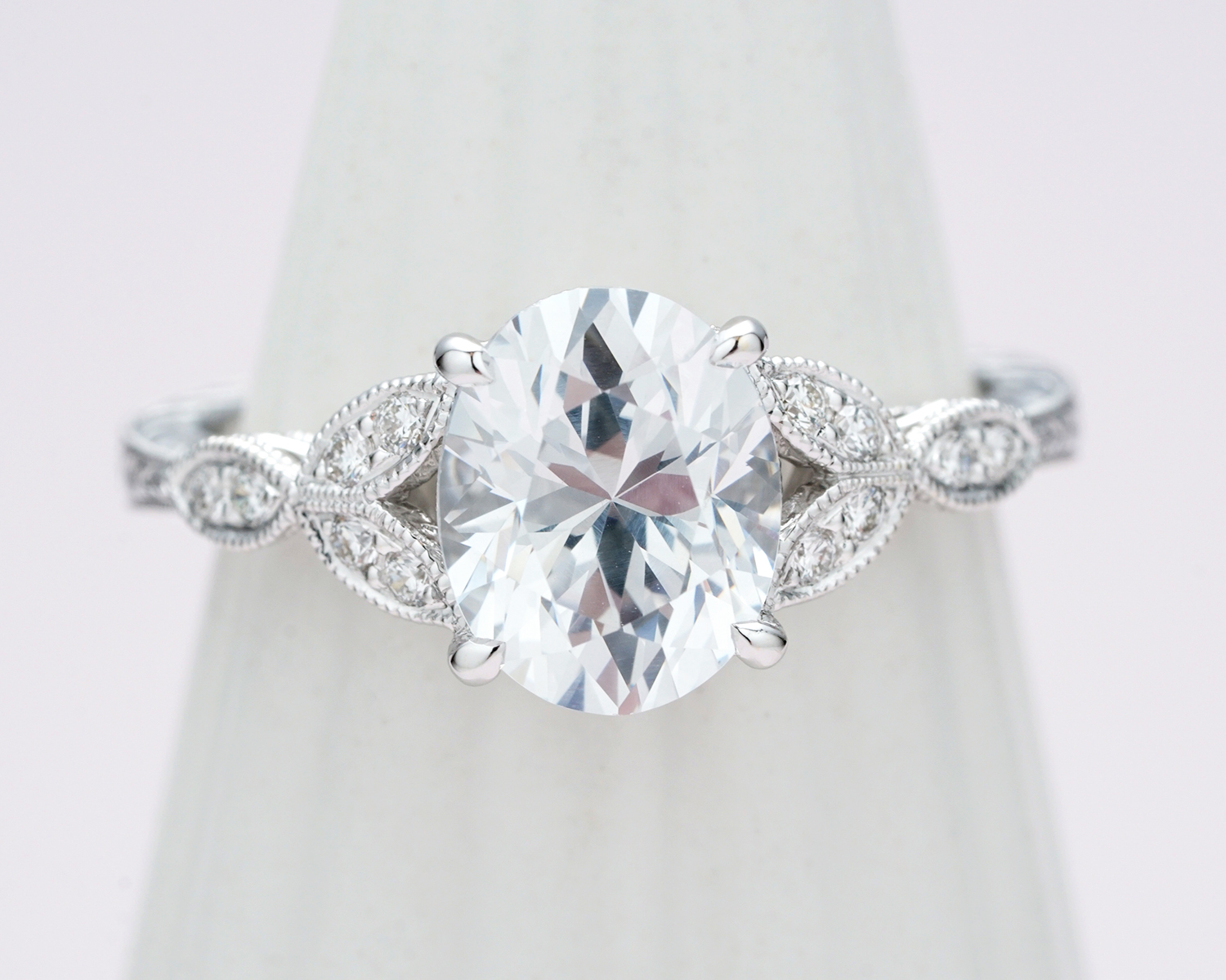 Tri-leaf Oval Diamond Engagement Ring