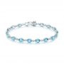  14K Gold Blue Topaz And Diamond Bracelet - Three-Quarter View -  103499 - Thumbnail