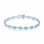  14K Gold Blue Topaz And Diamond Bracelet - Three-Quarter View -  103499 - Thumbnail