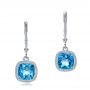 14k White Gold Antique Cushion Blue Topaz Earrings - Three-Quarter View -  100459 - Thumbnail