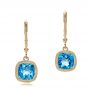 18k Yellow Gold 18k Yellow Gold Antique Cushion Blue Topaz Earrings - Three-Quarter View -  100459 - Thumbnail