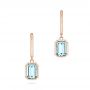 14k Rose Gold 14k Rose Gold Aquamarine Huggies - Three-Quarter View -  106606 - Thumbnail