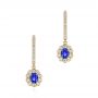 14k Yellow Gold 14k Yellow Gold Blue Sapphire And Diamond Earrings - Three-Quarter View -  106455 - Thumbnail