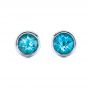 14k White Gold Blue Topaz Bezel Set Stud Earrings - Three-Quarter View -  101027 - Thumbnail