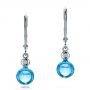 14k White Gold Blue Topaz Cabochon And Diamond Earrings - Three-Quarter View -  100450 - Thumbnail