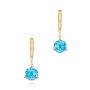 18k Yellow Gold 18k Yellow Gold Blue Topaz Dangle Earrings - Three-Quarter View -  106389 - Thumbnail