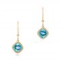 14k Yellow Gold Blue Topaz Earrings