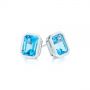  Platinum Platinum Blue Topaz Emerald Cut Stud Earrings - Front View -  105440 - Thumbnail