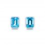 18k White Gold Blue Topaz Emerald Cut Stud Earrings