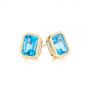 18k Yellow Gold 18k Yellow Gold Blue Topaz Emerald Cut Stud Earrings - Front View -  105440 - Thumbnail