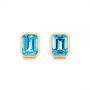 18k Yellow Gold Blue Topaz Emerald Cut Stud Earrings