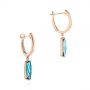 18k Rose Gold 18k Rose Gold Blue Topaz Huggie Earrings - Front View -  105437 - Thumbnail