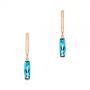 14k Rose Gold Blue Topaz Huggie Earrings