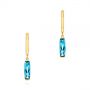 14k Yellow Gold Blue Topaz Huggie Earrings