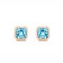 14k Rose Gold 14k Rose Gold Blue Topaz Stud Earrings - Three-Quarter View -  106037 - Thumbnail