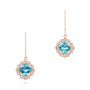 14k Rose Gold 14k Rose Gold Blue Topaz And Diamond Halo Earrings - Three-Quarter View -  103586 - Thumbnail