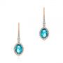 18k Rose Gold 18k Rose Gold Blue Topaz And Diamond Halo Earrings - Three-Quarter View -  106047 - Thumbnail
