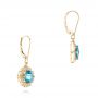 14k Yellow Gold 14k Yellow Gold Blue Topaz And Diamond Halo Earrings - Front View -  103586 - Thumbnail