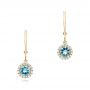 18k Yellow Gold 18k Yellow Gold Blue Topaz And Diamond Halo Earrings - Three-Quarter View -  102609 - Thumbnail