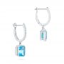  14K Gold Blue Topaz And Diamond Huggie Earrings - Front View -  106550 - Thumbnail
