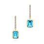 18k Yellow Gold 18k Yellow Gold Blue Topaz And Diamond Huggie Earrings - Three-Quarter View -  106550 - Thumbnail