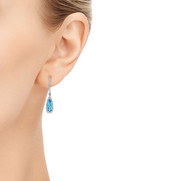 14k White Gold Blue Topaz And Diamond Leverback Earrings - Hand View - 106022