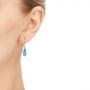 14k White Gold Blue Topaz And Diamond Leverback Earrings - Hand View -  106022 - Thumbnail