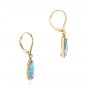 14k Yellow Gold 14k Yellow Gold Blue Topaz And Diamond Leverback Earrings - Front View -  106022 - Thumbnail