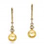14k Yellow Gold 14k Yellow Gold Citrine Cabochon And Diamond Earrings - Three-Quarter View -  100449 - Thumbnail