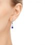  Platinum Platinum Custom Tanzanite And Diamond Earrings - Hand View -  103984 - Thumbnail