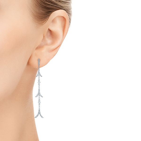 14k White Gold Diamond Arrow Drop Earrings - Hand View - 105327