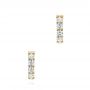 14k Yellow Gold 14k Yellow Gold Diamond Huggies - Three-Quarter View -  106354 - Thumbnail