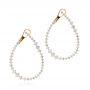 14k Yellow Gold 14k Yellow Gold Diamond Twist Hoop Earrings - Three-Quarter View -  106964 - Thumbnail