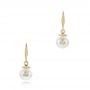 14k Yellow Gold 14k Yellow Gold Fresh White Pearl And Diamond Earrings - Three-Quarter View -  102575 - Thumbnail