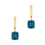 14k Yellow Gold London Blue Topaz Huggies - Three-Quarter View -  106004 - Thumbnail