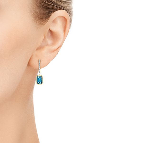 14k Yellow Gold 14k Yellow Gold London Blue Topaz And Diamond Halo Earrings - Hand View - 106446