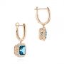 14k Rose Gold 14k Rose Gold London Blue Topaz And Diamond Halo Huggies - Front View -  105419 - Thumbnail