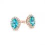 18k Rose Gold 18k Rose Gold Oval Blue Zircon And Diamond Halo Earrings - Front View -  105010 - Thumbnail