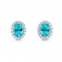 14k White Gold Oval Blue Zircon And Diamond Halo Earrings - Three-Quarter View -  105010 - Thumbnail