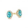 14k Yellow Gold 14k Yellow Gold Oval Blue Zircon And Diamond Halo Earrings - Front View -  105010 - Thumbnail