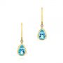 18k Yellow Gold 18k Yellow Gold Pear Shaped Blue Topaz And Diamond Earrings - Three-Quarter View -  106055 - Thumbnail
