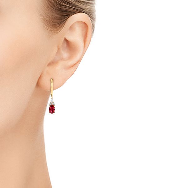 14k Yellow Gold Ruby And Diamond Earrings - Hand View - 106059
