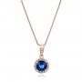 14k Rose Gold 14k Rose Gold Blue Sapphire And Diamond Halo Pendant - Three-Quarter View -  100977 - Thumbnail