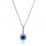 Blue Sapphire And Diamond Halo Earrings