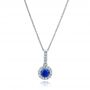  Platinum Blue Sapphire And Diamond Halo Pendant