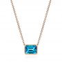 14k Rose Gold Blue Topaz Pendant