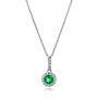  Platinum Emerald And Diamond Halo Pendant