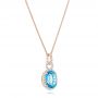 14k Rose Gold 14k Rose Gold Oval Blue Topaz And Diamond Halo Pendant - Flat View -  102612 - Thumbnail