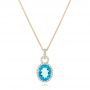 18k Yellow Gold 18k Yellow Gold Oval Blue Topaz And Diamond Halo Pendant - Three-Quarter View -  102612 - Thumbnail