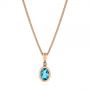 14k Rose Gold 14k Rose Gold Oval Blue Topaz And Diamond Pendant - Three-Quarter View -  106058 - Thumbnail